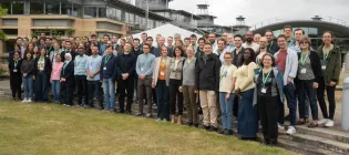 Group of students and staff members with Natalia stood at the front on the right