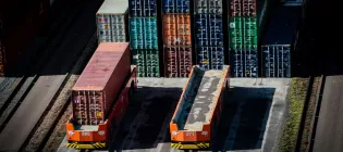 Automated guided carts at the port of Rotterdam transport large containers