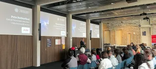 Pete Rutherford from Aon giving a PowerPoint presentation