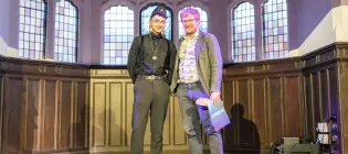 A photo of Jonathan Hickman receiving his award