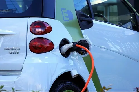 Electric car getting charged 