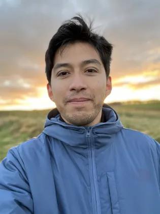 Image of Christian, an MSc Computational Applied Mathematics graduate.