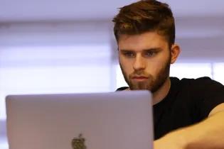 Man studying on his computer 